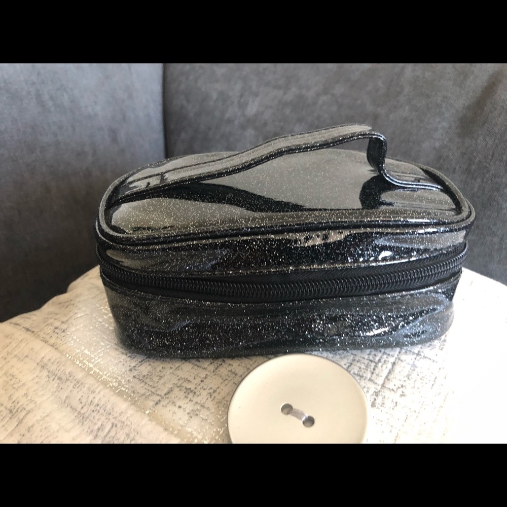 Make up pouch small black glitter in color